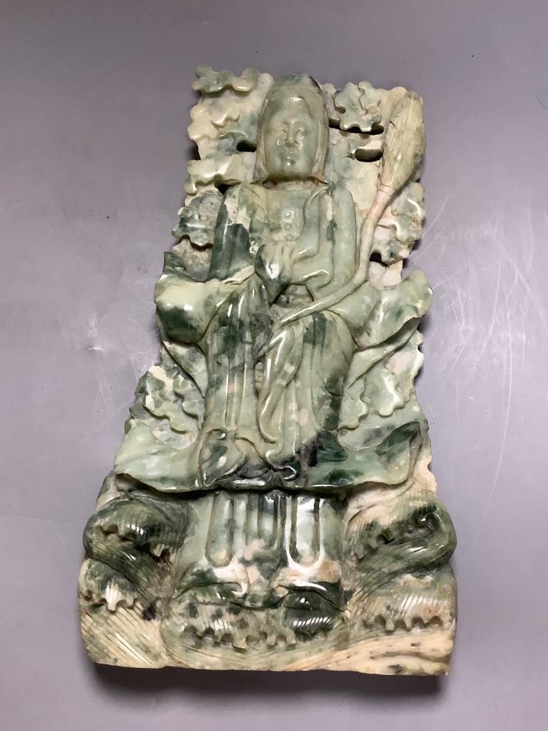 A Chinese jadeite carving of Guanyin, length 33cm